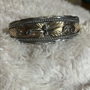 Navajo Herbert Tsosie sterling silver feather bracelet with gold overlay
